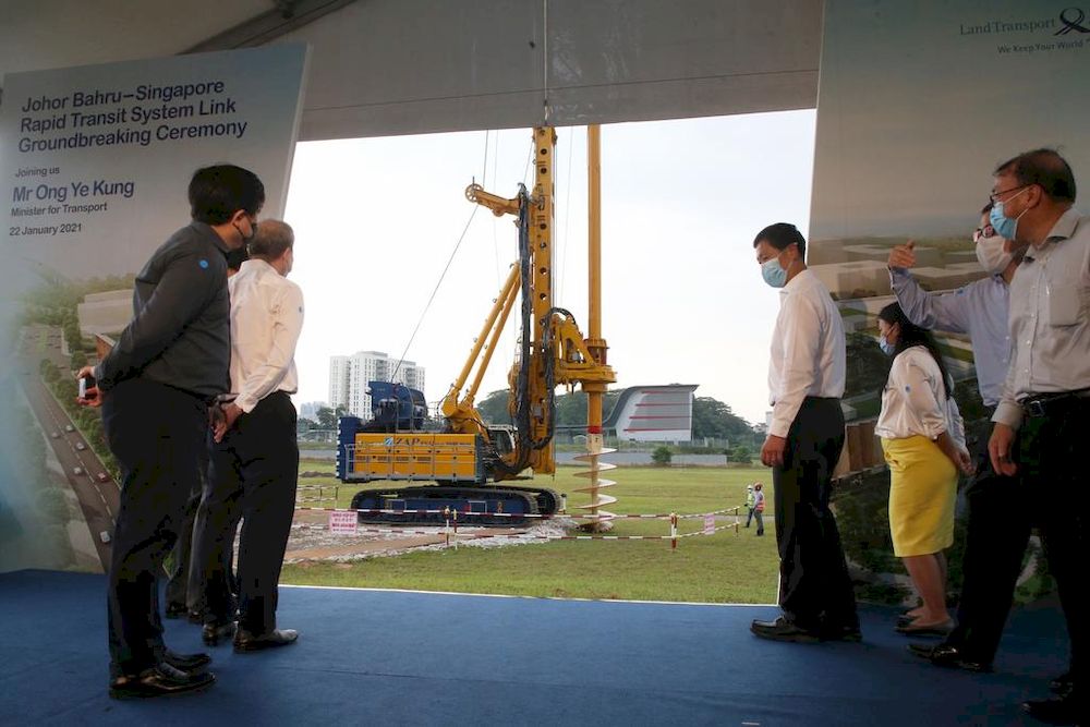 Minister for Transport Ong Ye Kung watches a rotary drilling rig drill into the ground at the Johor Bahru-Singapore Rapid Transit System Link Groundbreaking Ceremony on Jan 22, 2021. u00e2u20acu201d TODAY pic