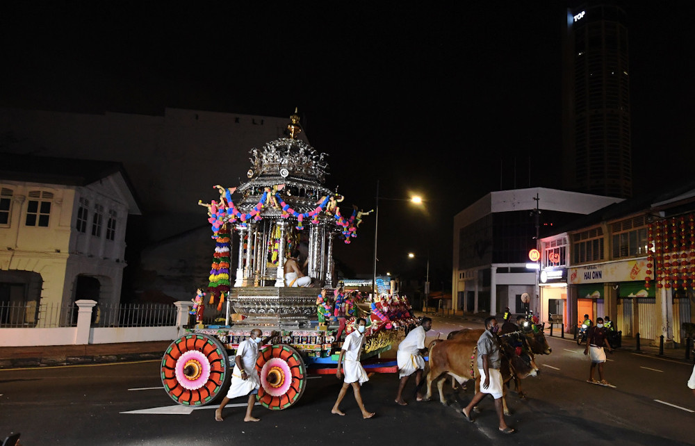 The silver chariot carrying the statue of Lord Muruga took off from Kovil Veedu (temple) in Penang Street at 3am, January 27, 2021. u00e2u20acu201d Bernama pic 