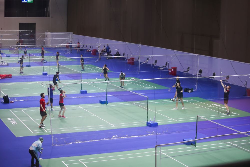 Players practice on the courts divided with plastic panels where the Yonex Thailand Open Badminton tournament is taking place at the Impact Arena in Bangkok January 6, 2021. u00e2u20acu201c Reuters pic