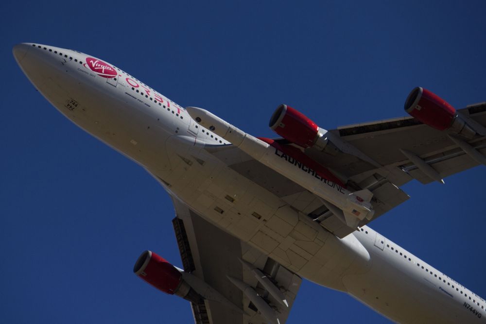 The Virgin Orbit 'Cosmic Girl' u00e2u20acu201d a modified Boeing Co. 747-400 carrying a LauncherOne rocket under its wing u00e2u20acu201d takes off for the Launch Demo 2 mission from Mojave Air and Space Port. u00e2u20acu201d AFP picnn