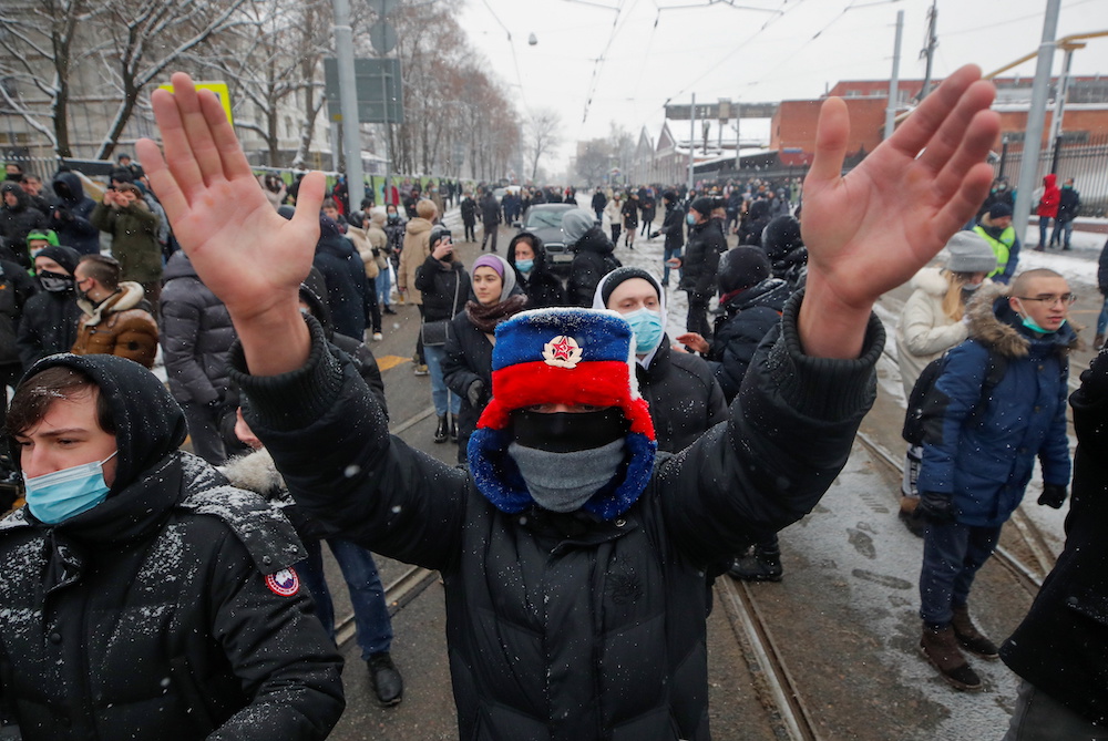 A protestor wears a hat with the national colours during a rally in support of jailed Russian opposition leader Alexei Navalny in Moscow, Russia January 31, 2021. u00e2u20acu201d Reuters pic