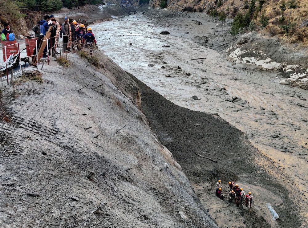 Members of Indo-Tibetan Border Police (ITBP) search for survivors after a Himalayan glacier broke and swept away a small hydroelectric dam, in Chormi village, India February 7, 2021. u00e2u20acu201d Reuters pic