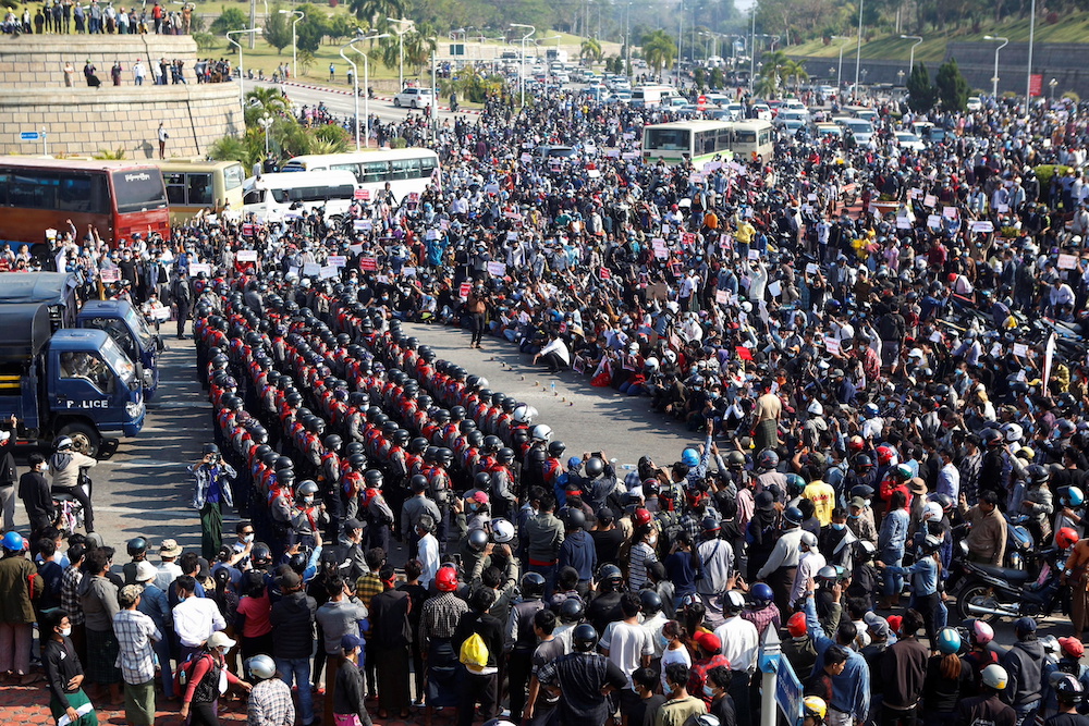 Police stand guard as protesters rally in a demonstration against the coup and to demand the release of elected leader Aung San Suu Kyi, in Naypyitaw, Myanmar February 8, 2021. u00e2u20acu201d Reuters pic