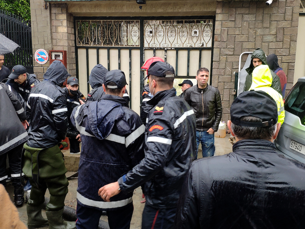 Emergency services gather at the site of illegal underground textile workshop that flooded after heavy rain fall in Morocco's city of Tangiers on February 8, 2021. u00e2u20acu201d AFP pic