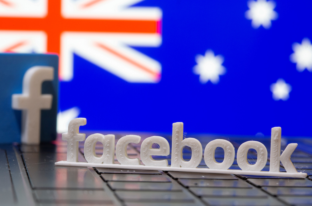 A 3D printed Facebook logo is seen in front of displayed Australia's flag in this illustration photo taken February 18, 2021. u00e2u20acu201d Reuters/Dado Ruvic pic