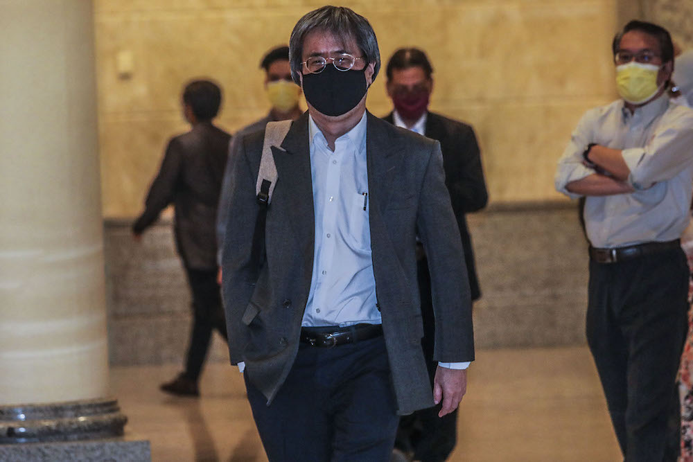 Malaysiakini editor-in-chief Steven Gan arrives at the Federal Court in Putrajaya February 19, 2021. u00e2u20acu2022 Picture by Hari Anggara