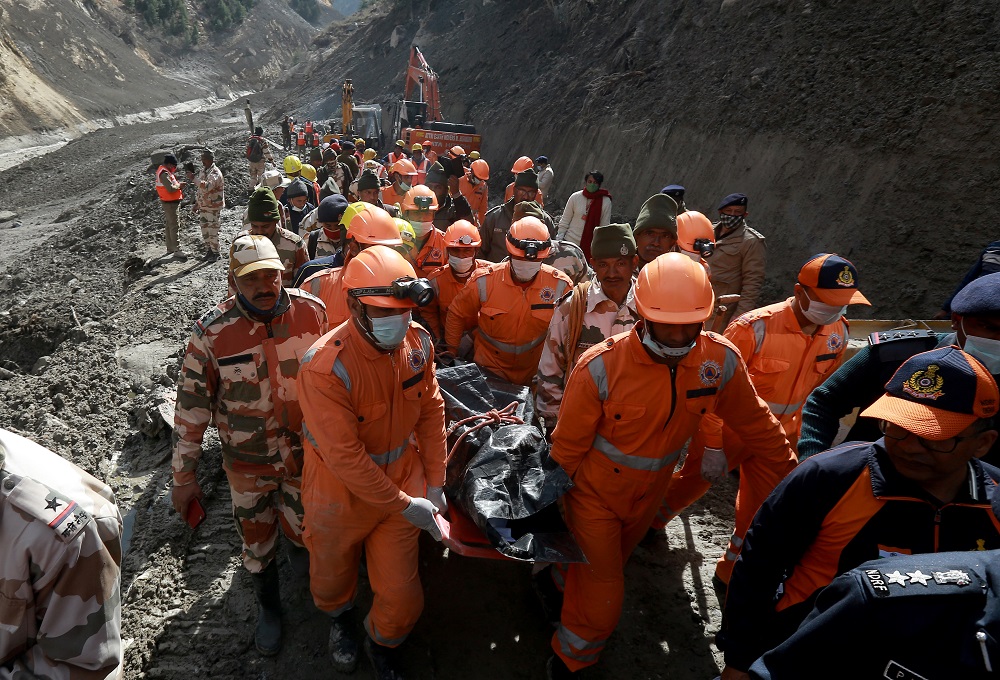 Members of National Disaster Response Force carry the body of a victim after recovering it from the debris during a rescue operation in Tapovan in the northern state of Uttarakhand, India February 9, 2021. u00e2u20acu201d Reuters pic 