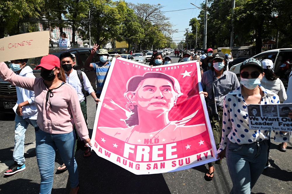 People gather outside the Chinese Embassy as they protest against the military coup and demand the release of elected leader Aung San Suu Kyi, in Yangon February 11, 2021. — Reuters pic 