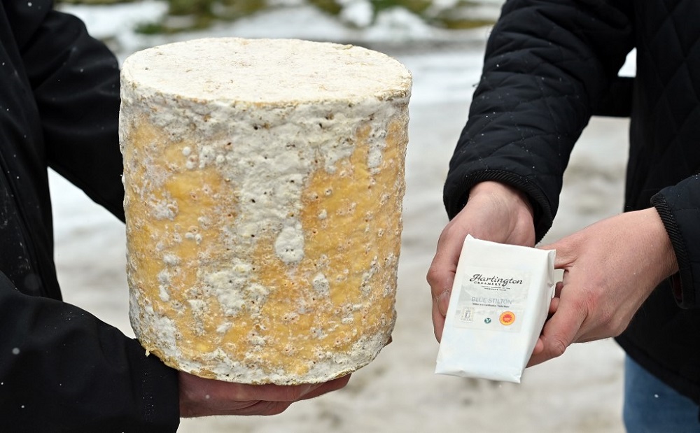 Robert Gosling (left) and Simon Spurrell (right) of Hartington Creamery pose holding cheese at the Creamery near Matlock in the Derbyshire Dales January 26, 2021. u00e2u20acu201d AFP pic