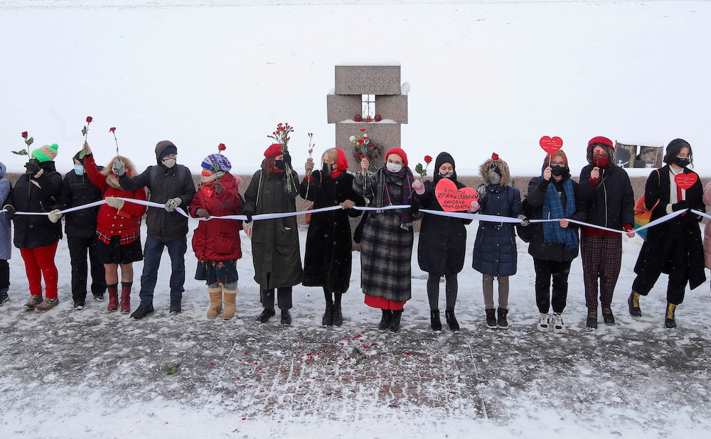 Participants form a human chain during a demonstration to support female political prisoners and to protest against police violence in Saint Petersburg, Russia February 14, 2021. u00e2u20acu201d Reuters pic
