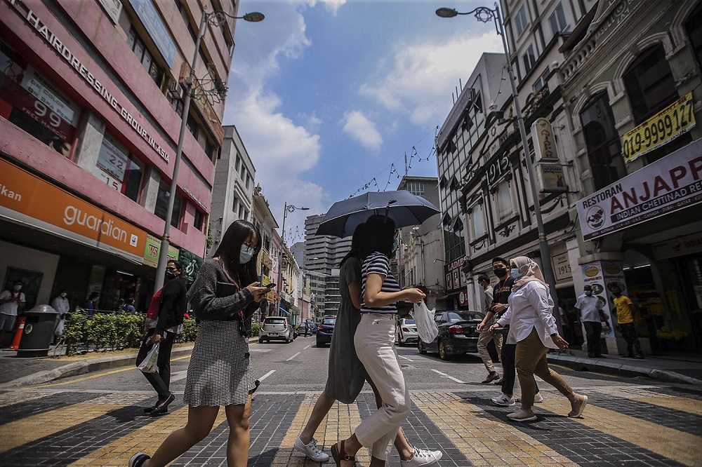 People were face masks during the movement control order, in Kuala Lumpur city centre February 16, 2021. u00e2u20acu201d Picture by Hari Anggara
