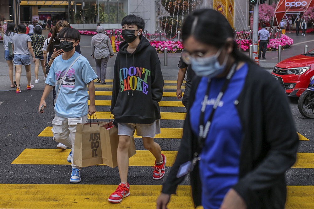 People were face masks during the movement control order, in Kuala Lumpur city centre February 16, 2021. u00e2u20acu201d Picture by Hari Anggara