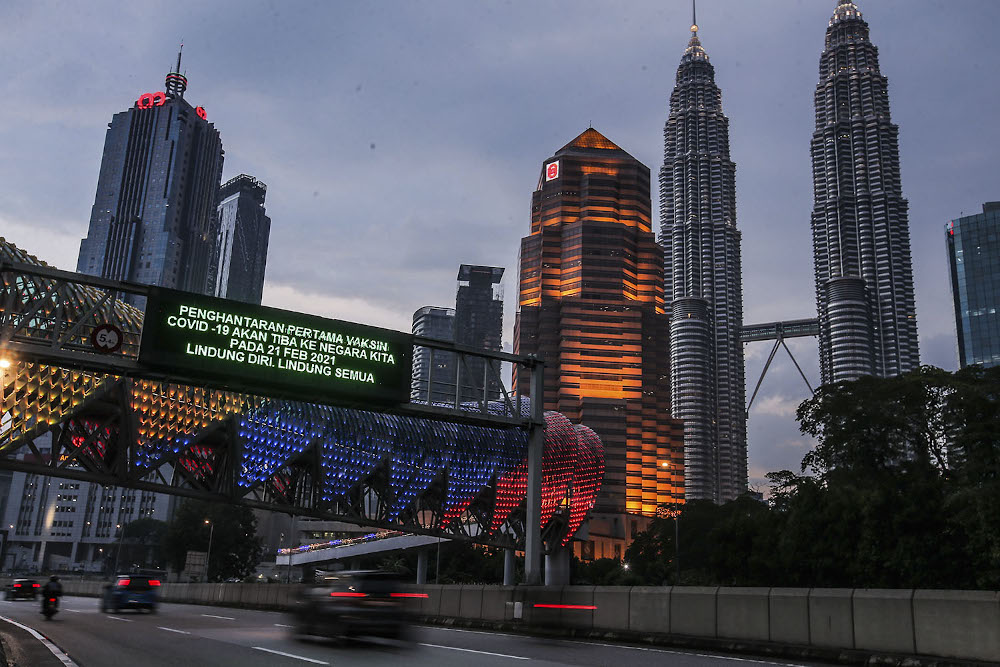 A giant LED board reading u00e2u20acu02dcFirst Delivery of Covid-19 Vaccine arrived on 21 Feb 2021u00e2u20acu2122 is seen in Kuala Lumpur February 17, 2021. u00e2u20acu201d Picture by Hari Anggara