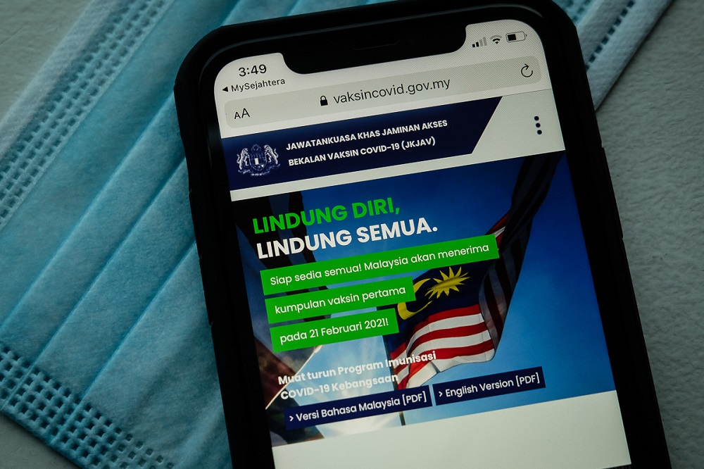 The section for Covid-19 vaccination registration via the MySejahtera mobile application is displayed on a mobile phone in Kuala Lumpur February 23, 2021. u00e2u20acu201dPicture by Yusof Mat Isa