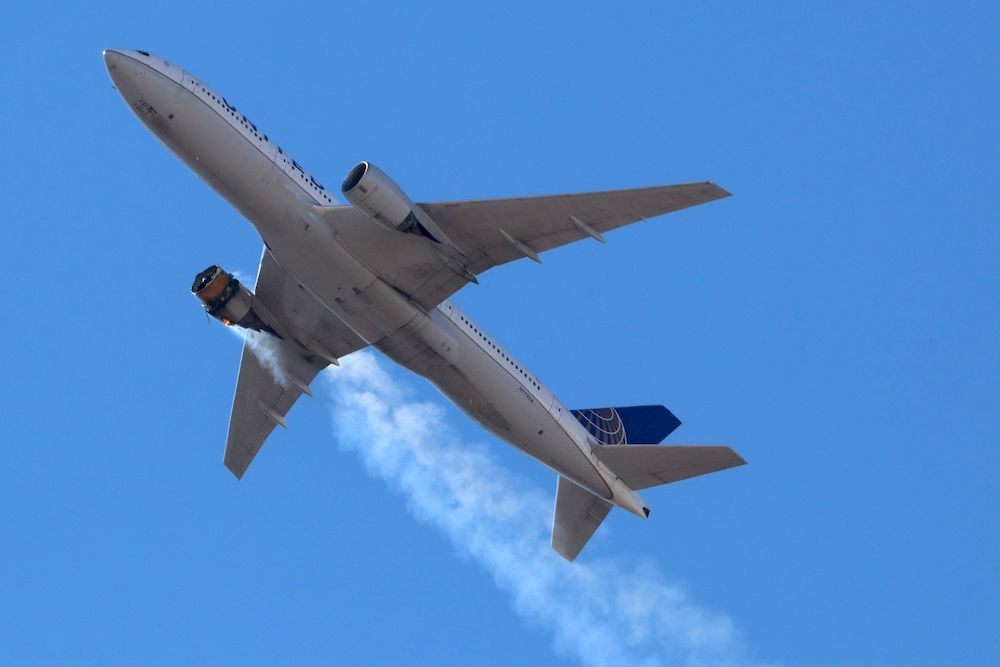 United Airlines flight UA328, carrying 231 passengers and 10 crew on board, returns to Denver International Airport with its starboard engine on fire, over Denver, Colorado, US February 20, 2021. u00e2u20acu201d Hayden Smith/@speedbird5280/Handout via Reuters