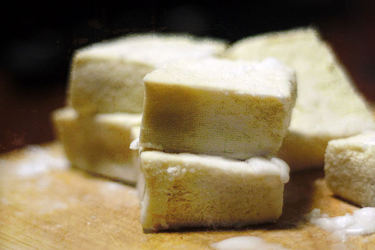 Pieces of firm tofu, known as 'koya dōfu' or 'momen dōfu' in Japanese.