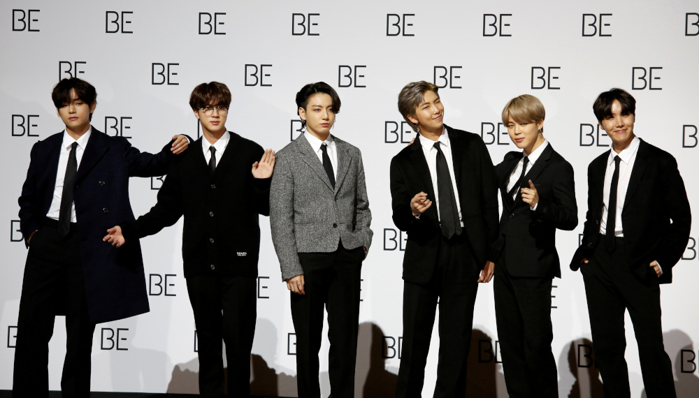 Members of K-pop boy band BTS pose for photographs during a news conference promoting their new album u00e2u20acu02dcBE (Deluxe Edition)u00e2u20acu2122 in Seoul, South Korea, November 20, 2020. u00e2u20acu201d Reuters picnn