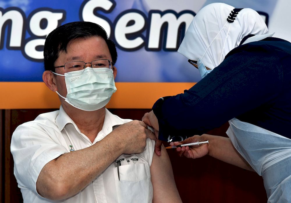 Penang Chief Minister Chow Kon Yeow receiving a Pfizer-BioNTech Covid-19 vaccine shot during the Covid-19 Phase One Immunisation Program inauguration ceremony at the Pulau Pinang Hospital, George Town, Feb 28, 2021. u00e2u20acu201d Bernama pic