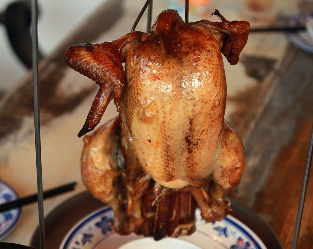 Famous for their Taiwanese urn baked chicken, Penang's Half Acre Restaurant has introduced their Chinese New Year full course meals and 'poon choy'. — Picture courtesy of Half Acre Restaurant's Facebook page