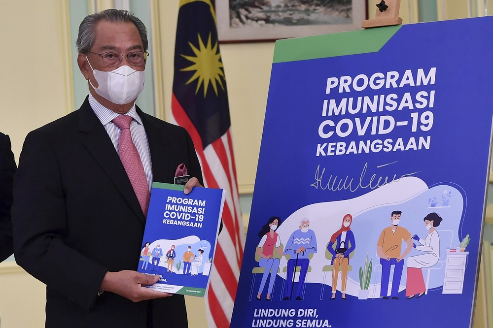 Prime Minister Tan Sri Muhyiddin Yassin at the launch of the National Covid-19 Immunisation Programme Handbook at the Perdana Putra Building in Putrajaya February 16, 2021. u00e2u20acu201d Bernama pic