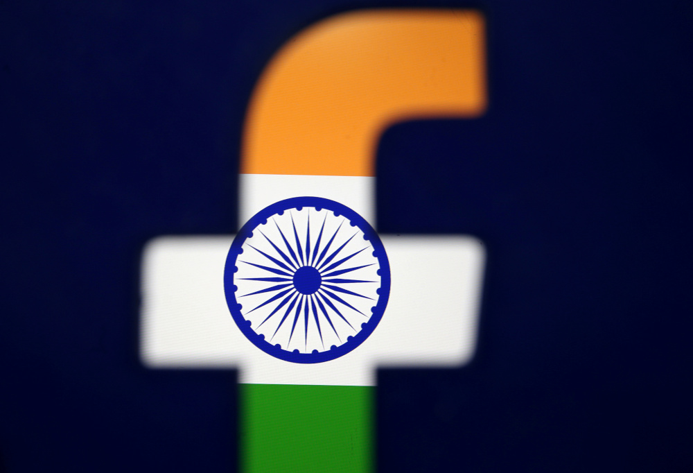 Indiau00e2u20acu2122s flag is seen through a 3D printed Facebook logo in this illustration picture, April 8, 2019. u00e2u20acu201d Reuters picnn