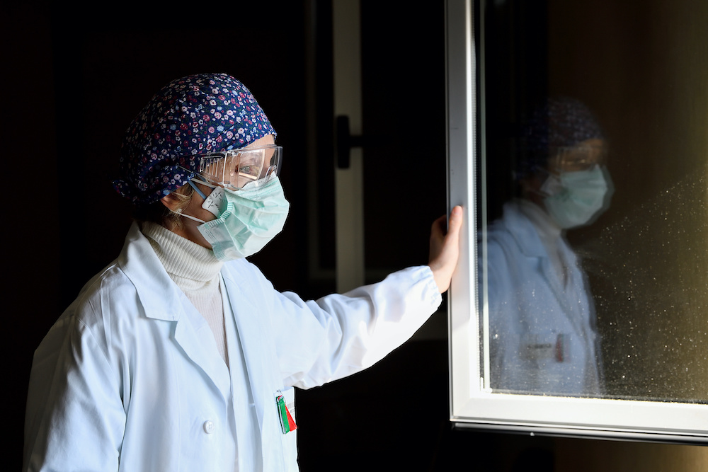 Laura Ricevuti, the medical doctor who diagnosed the first case of Covid-19 in an Italian patient with Dr. Malara on February 20, looks through the window at Codogno Hospital one year after the small northern town became Europeu00e2u20acu2122s coronavirus disease epi