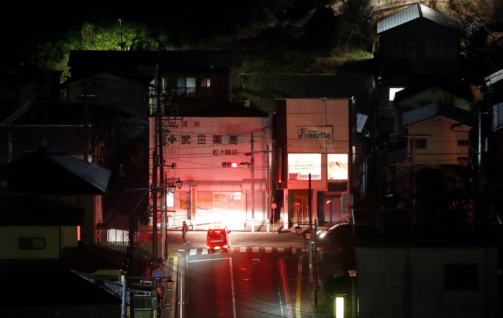 A firefighter vehicle patrols streets following a strong earthquake in Iwaki, Fukushima prefecture, Japan February 13, 2021. u00e2u20acu201d Reuters picnnn
