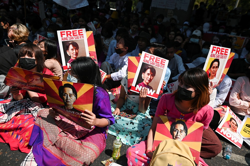Factory workers hold placards as they rally against the military coup in Yangon, Myanmar February 25, 2021. u00e2u20acu2022 Reuters pic 