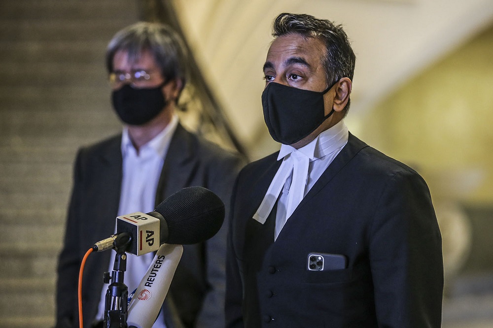 Malaysiakini's lead counsel Datuk Malik Imtiaz Sarwar speaks to reporters at the Federal Court in Putrajaya February 19, 2021. ― Picture by Hari Anggara