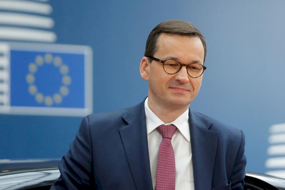 Polandu00e2u20acu2122s Prime Minister Mateusz Morawiecki speaks as he arrives to attend a face-to-face EU summit amid the coronavirus disease (Covid-19) lockdown in Brussels, Belgium December 10, 2020. u00e2u20acu201d Reuters pic