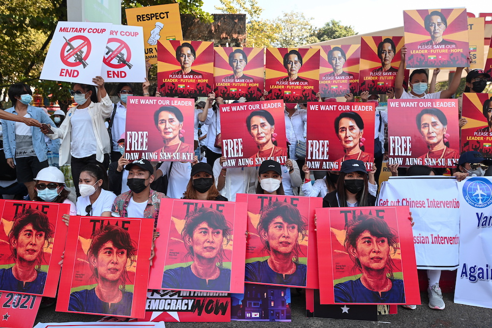 Demonstrators hold up signs during a protest against the military coup and demanding the release of elected leader Aung San Suu Kyi, in Yangon, Myanmar, February 13, 2021. u00e2u20acu201d Reuters picnnnn