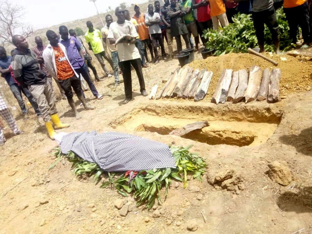 People attend the burial of Monday Doma, a student that was killed after gunmen stormed a Government Science College Kagara and kidnapped 27 others, in Niger state, Nigeria February 17, 2021. u00e2u20acu201d Reuters pic 