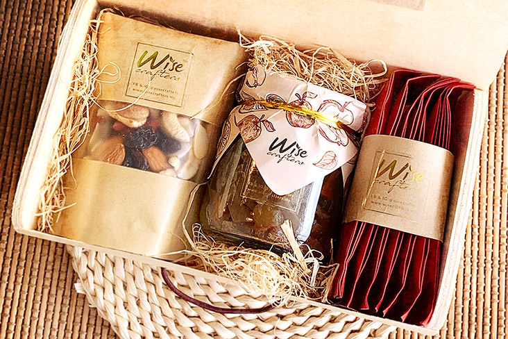 The Wise Crafters CNY Treasure Box contains spiced apple chutney, healthy snacks and osmanthus oolong tea. – Picture courtesy of Wise Crafters
