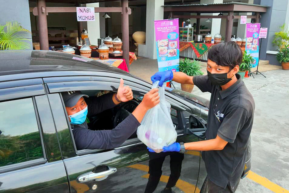 AnCasa Residences Port Dickson is selling food prepared by its own chefs using a drive-thru concept. u00e2u20acu201d Bernama pic 