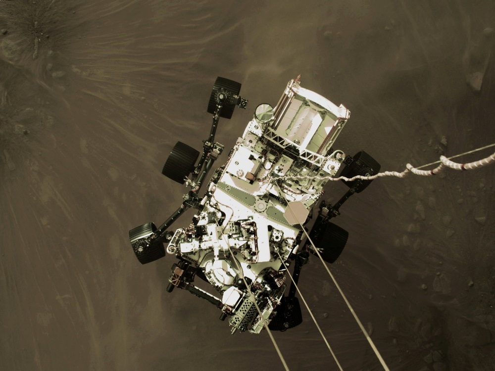 Nasa's Perseverance rover descends to touch down on Mars in a still image from a video camera aboard the descent stage taken February 18, 2021. u00e2u20acu2022 Nasa/JPL-Caltech/Handout via Reuters