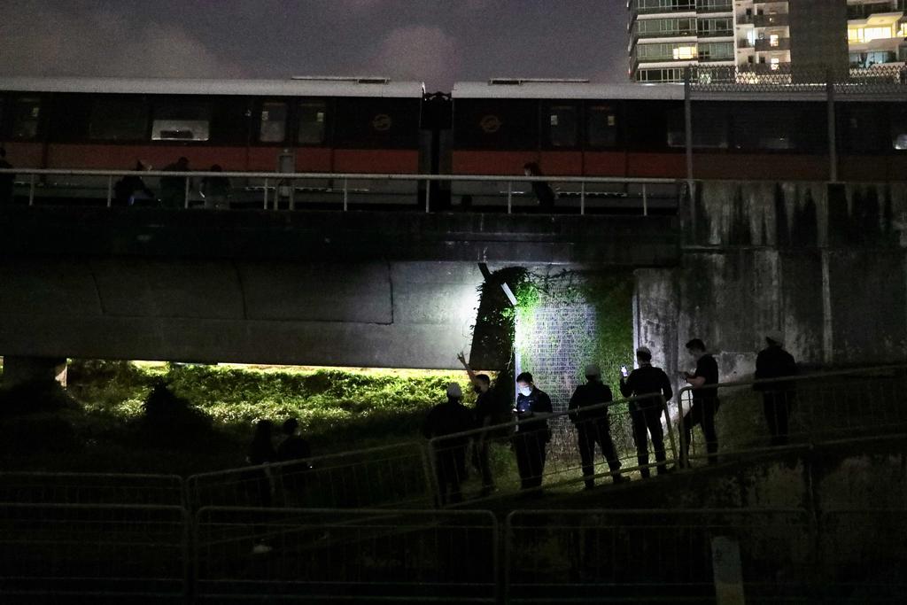 Officers from the police and the Singapore Civil Defence Force at the vicinity of Kallang MRT Station on February 25, 2021. u00e2u20acu2022 TODAY pic