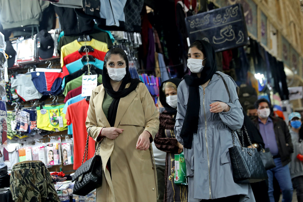 Iranian women walk through a bazaar in Tehran, December 6, 2020.  u00e2u20acu201d Reuters pic