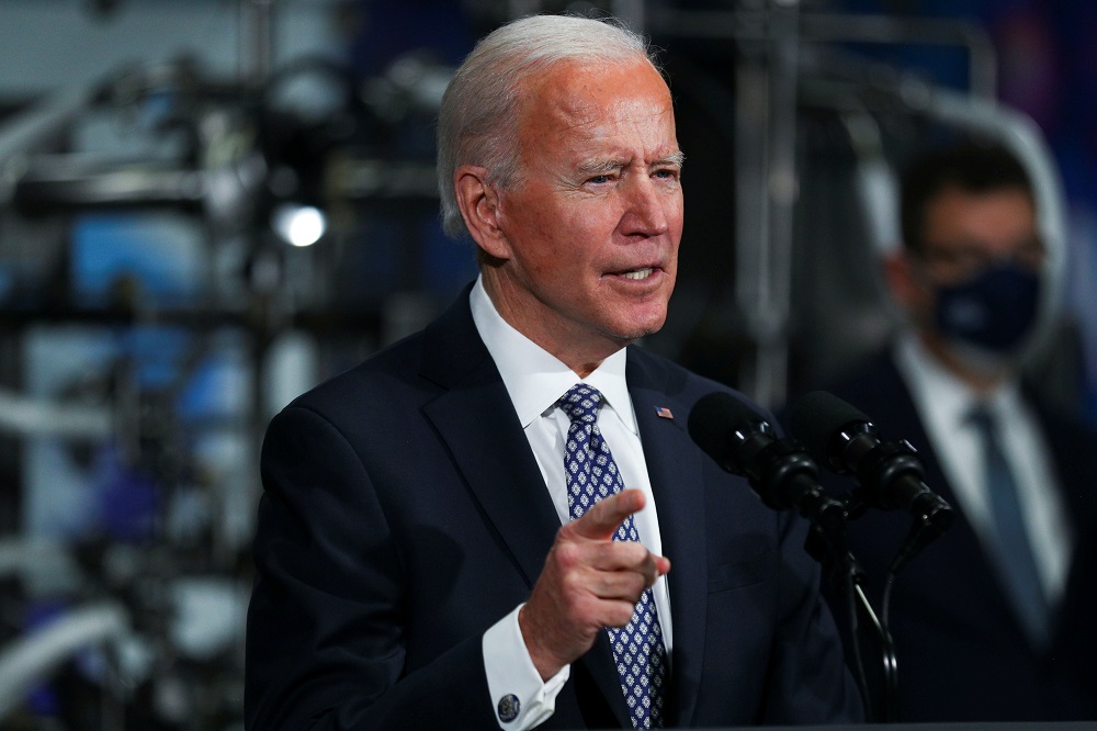 US President Joe Biden speaks after a tour of a Pfizer manufacturing plant producing the Covid-19 vaccine in Kalamazoo, Michigan February 19, 2021. u00e2u20acu2022 Reuters pic