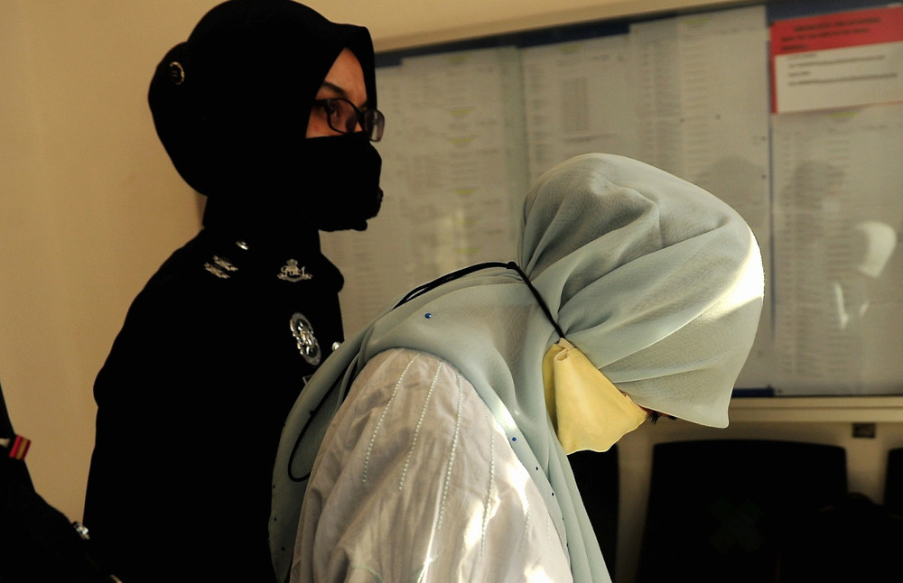 Zuriati Mohamed Yusoff, 47, a former director at Millionaire Synergy Sdn Bhd, pleaded not guilty after all the charges were read out to her before Judge Yang Zaimey Yang Ghazali. u00e2u20acu201d Bernama pic 