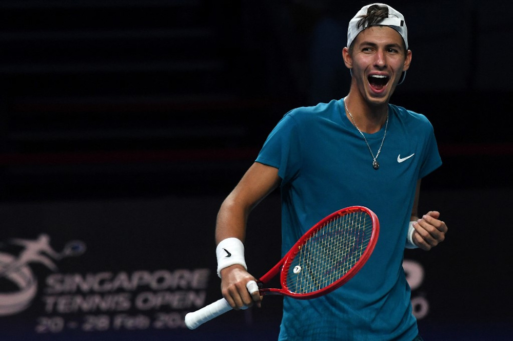 Australiau00e2u20acu2122s Alexei Popyrin celebrates beating Kazakhstanu00e2u20acu2122s Alexander Bublik in their menu00e2u20acu2122s singles final match at the Singapore Tennis Open tournament in Singapore on February 28, 2021. u00e2u20acu201d AFP pic