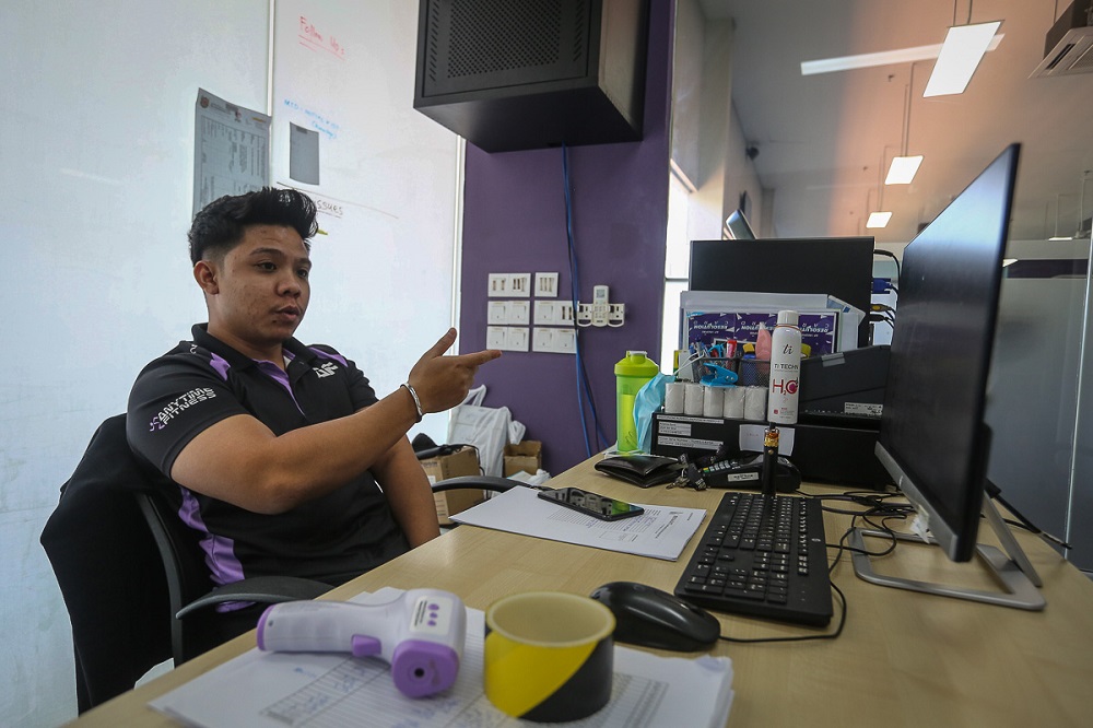 Senior brand ambassador Mohamad Fahmi Suhairi Suhaimi speaks during an interview with Malay Mail at Anytime Fitness in Shah Alam February 12, 2021. ― Picture by Yusof Mat Isa