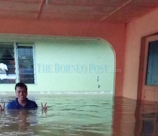 Houses at Kampung Pangkalan Kuap inundated by flood this morning. u00e2u20acu2022 Picture via WhatsApp/Borneo Post