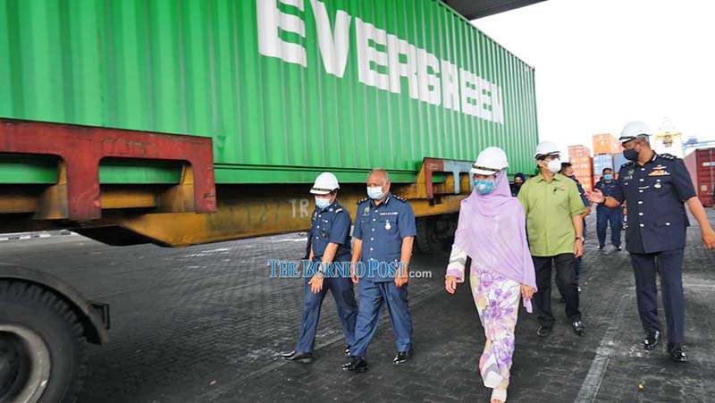 Datuk Seri Fatimah Abdullah (front, third left) accompanied by others during her working visit to Senari Port. u00e2u20acu2022 Borneo Post pic