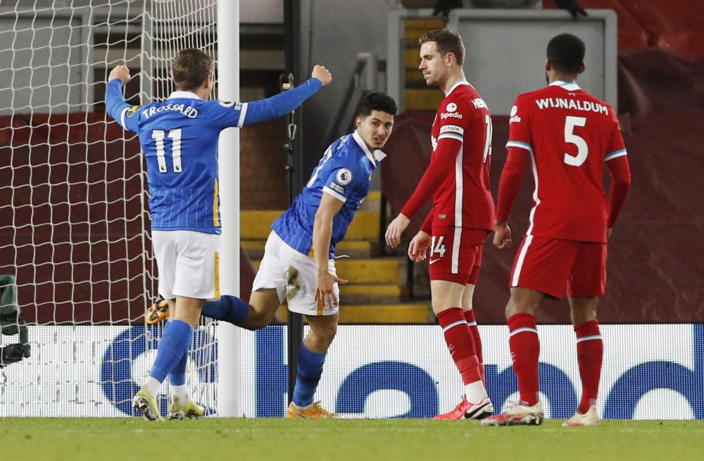 Brighton & Hove Albion's Steven Alzate celebrates scoring their first goal with Leandro Trossard as Liverpool's Jordan Henderson looks dejected at Anfield, Liverpool February 3, 2021. u00e2u20acu2022 Reuters pic