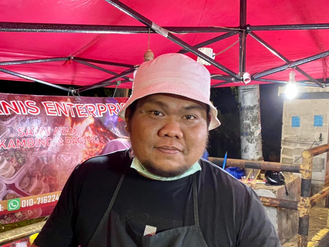 Mustaffar Jumaat, 30, said he has family to look after, and cannot afford to fall sick from potential side effects of the vaccine. — Picture by Ben Tan