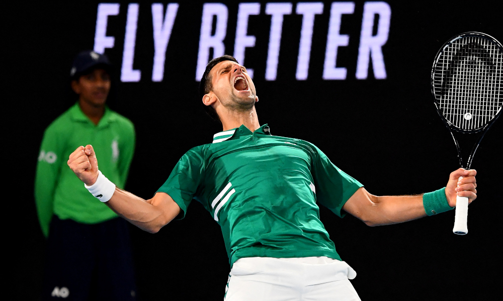 Serbiau00e2u20acu2122s Novak Djokovic celebrates after winning against Taylor Fritz of the US during their menu00e2u20acu2122s singles match on day five of the Australian Open tennis tournament in Melbourne February 12, 2021. u00e2u20acu201d AFP picnn