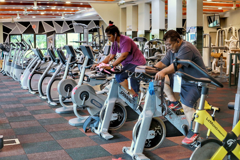 Gym-goers working out at Enrich Fitness centre in Ampang February 12, 2021. u00e2u20acu201d Picture by Ahmad Zamzahuri