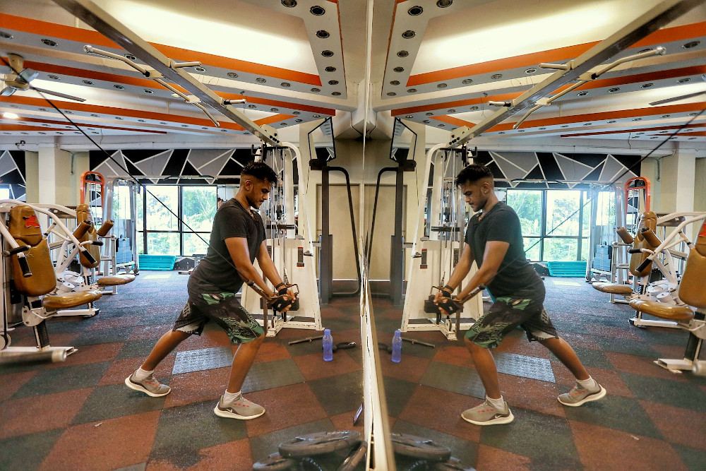 Gym-goers working out at Enrich Fitness centre in Ampang February 12, 2021. u00e2u20acu201d Picture by Ahmad Zamzahuri