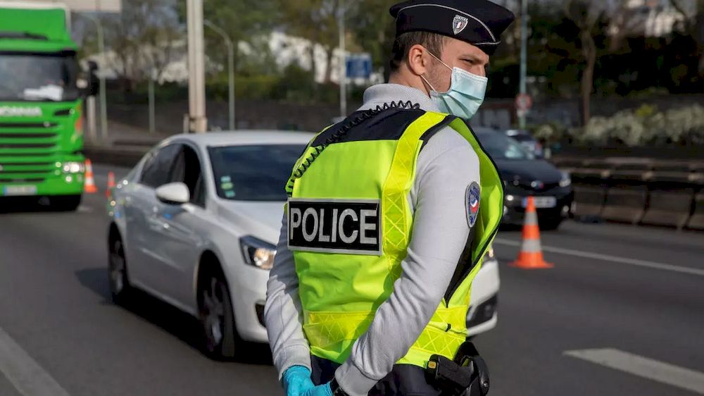 French police check motoristsu00e2u20acu2122 outings authorisation on Parisu00e2u20acu2122s ring road on April 11, 2020, during the 26th day of a strict lockdown in France aimed at curbing the spread of the Covid-19 disease. u00e2u20acu201d AFP pic