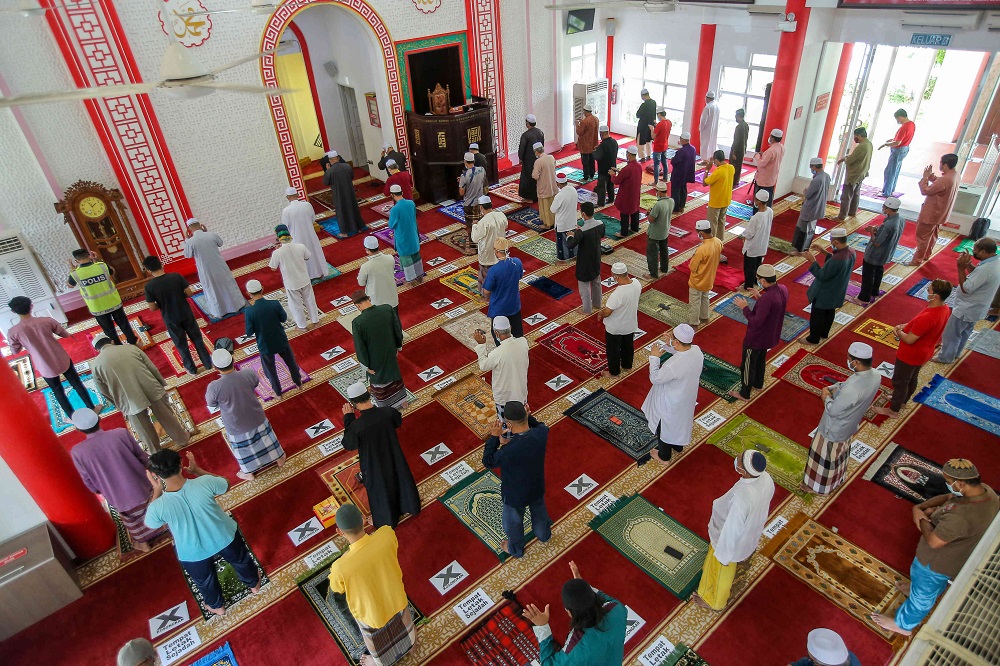 Muslims perform Friday prayers at the Muhammadiah Mosque in Ipoh February 12, 2021. u00e2u20acu2022 Picture by Farhan Najib